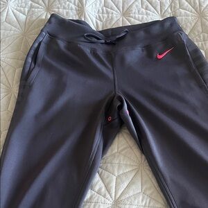 Nike women’s Gray pants with Pink Logo Sz sm